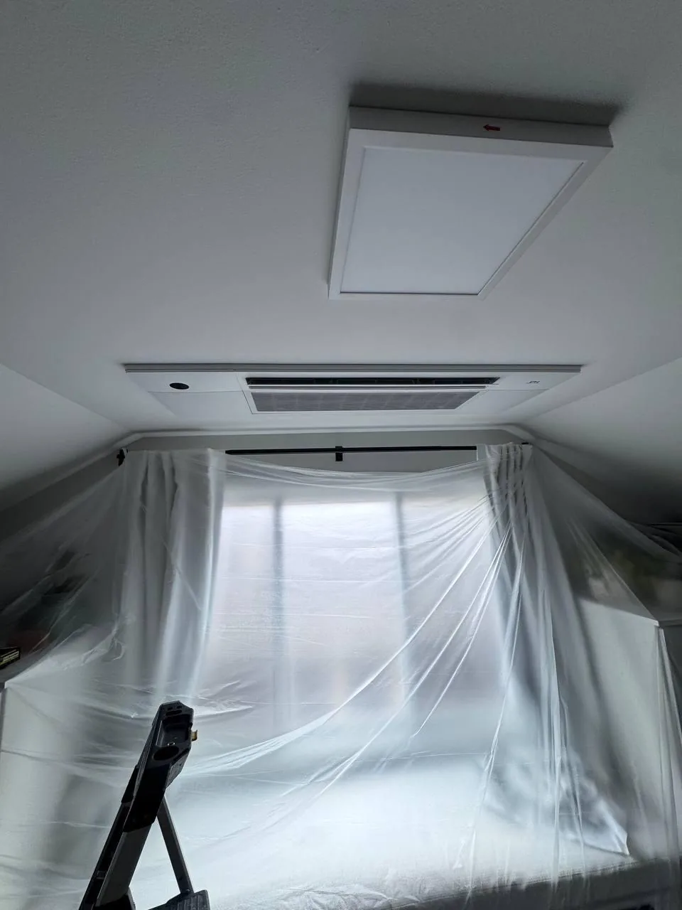 Ceiling cassette installation in progress