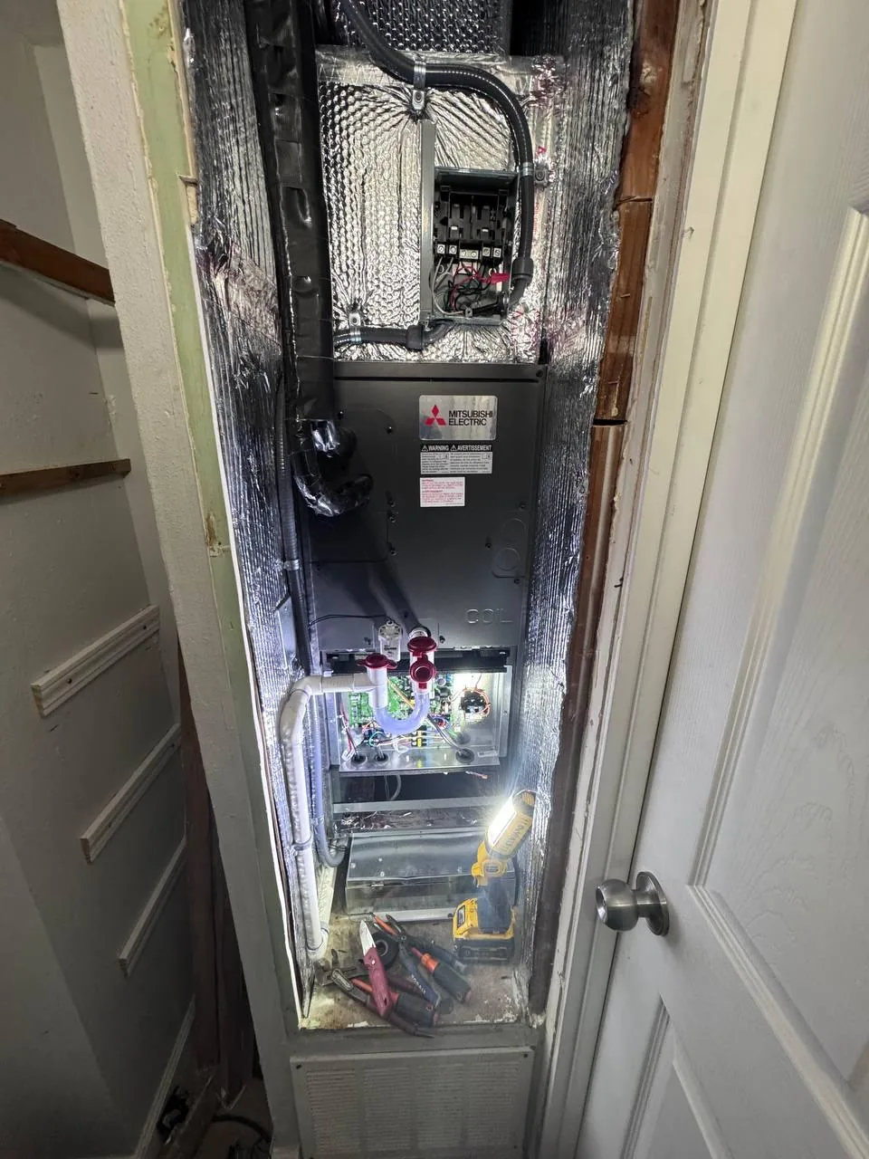 Air handler in mechanical closet