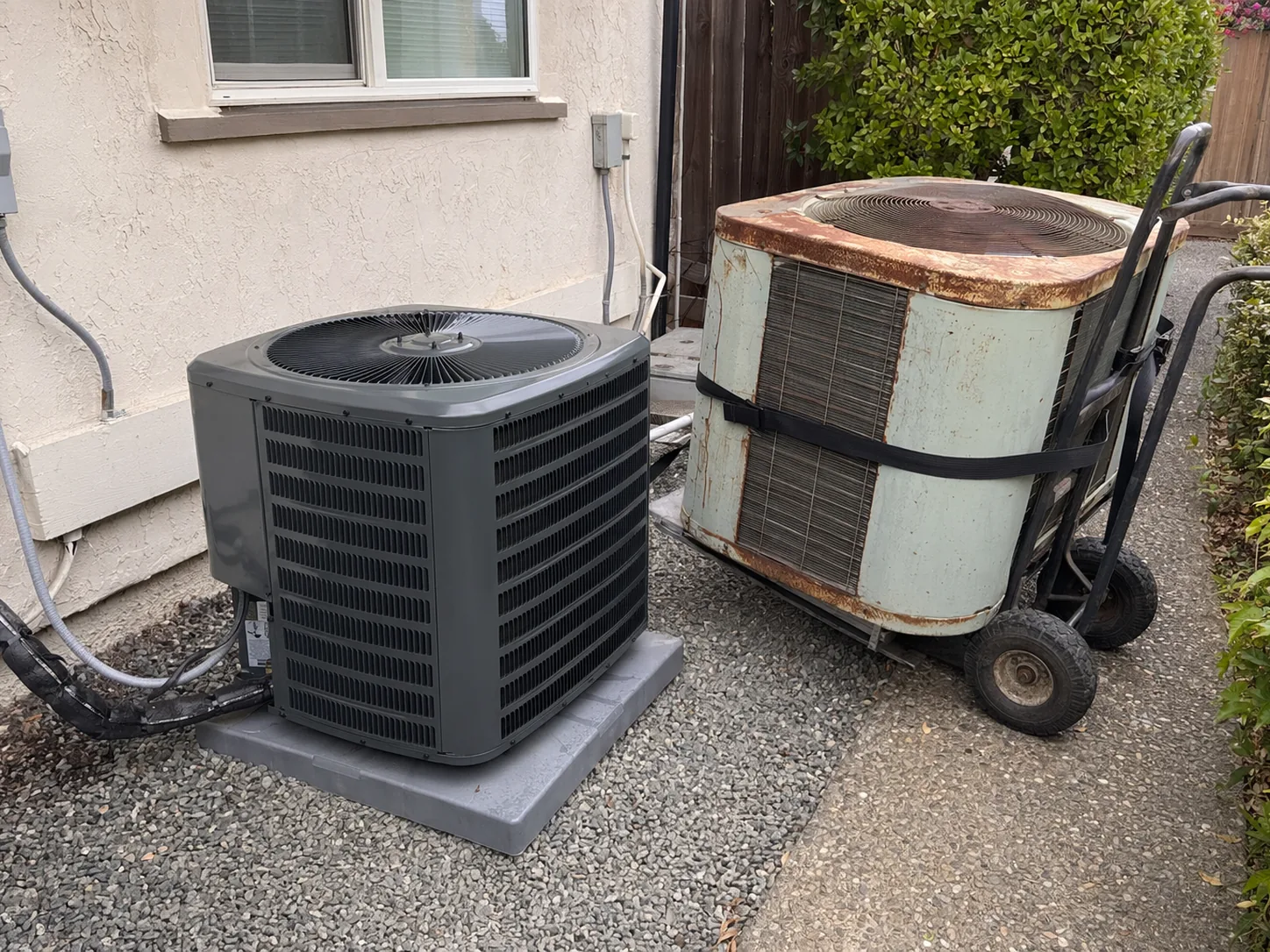 New residential AC condenser installed beside a home in Hayward, Bay Area