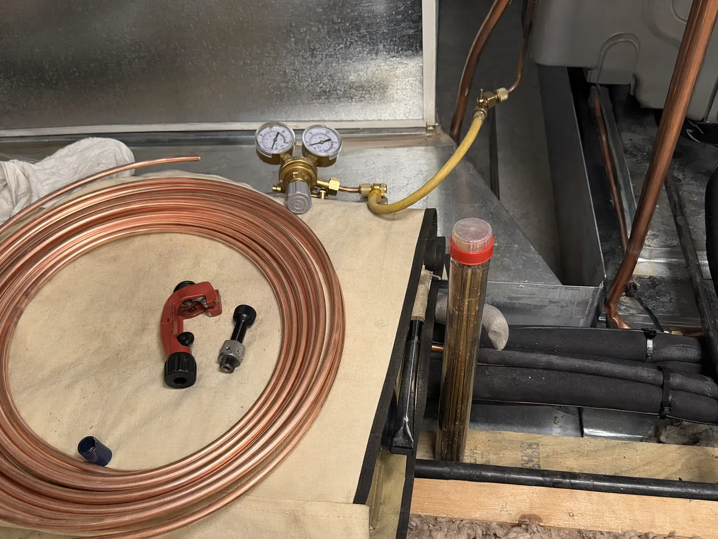 Copper refrigerant line set being routed through a clean utility space